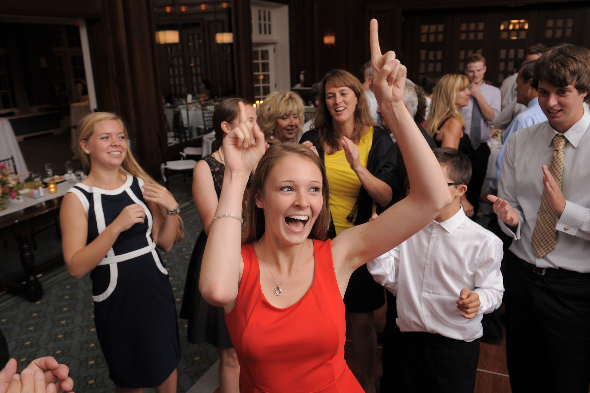 Detroit Golf Club wedding photographer's photo of wedding guests having a grand old time dancing at the Detroit Golf Club.